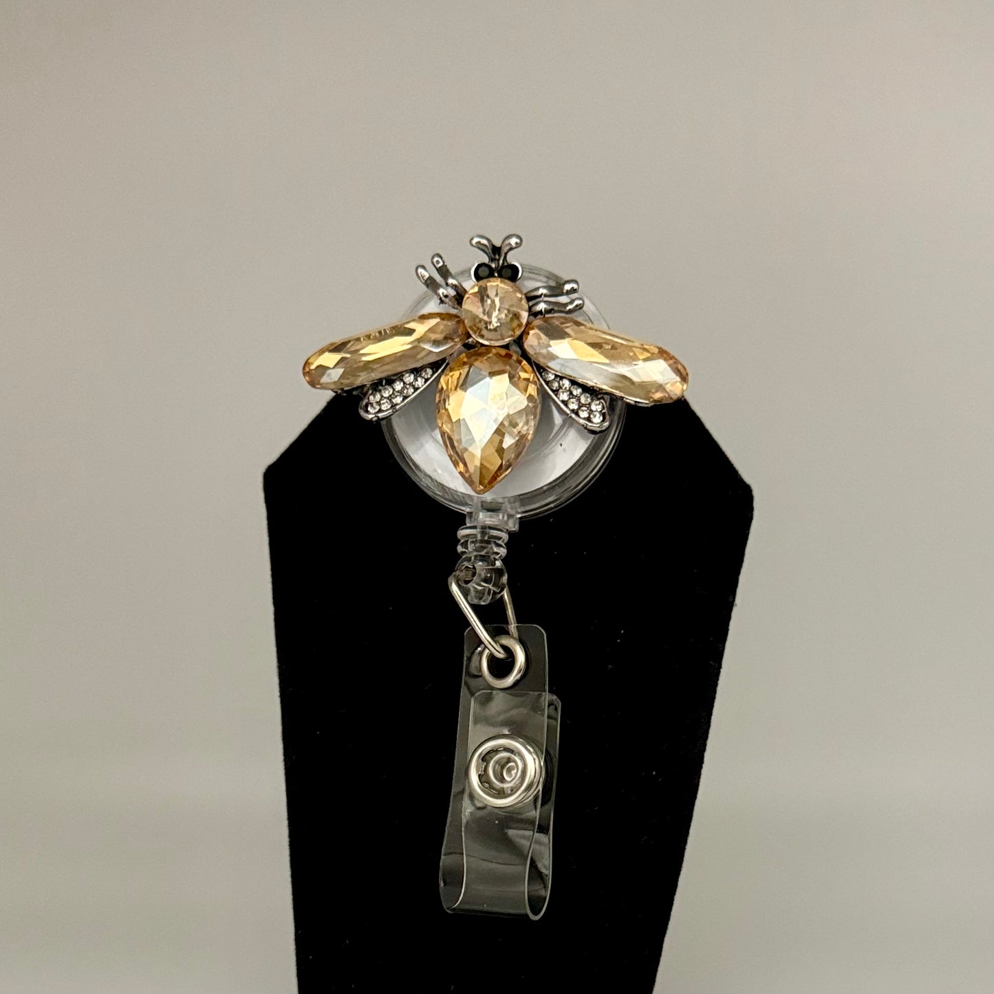 Champagne Bee Badge Reel