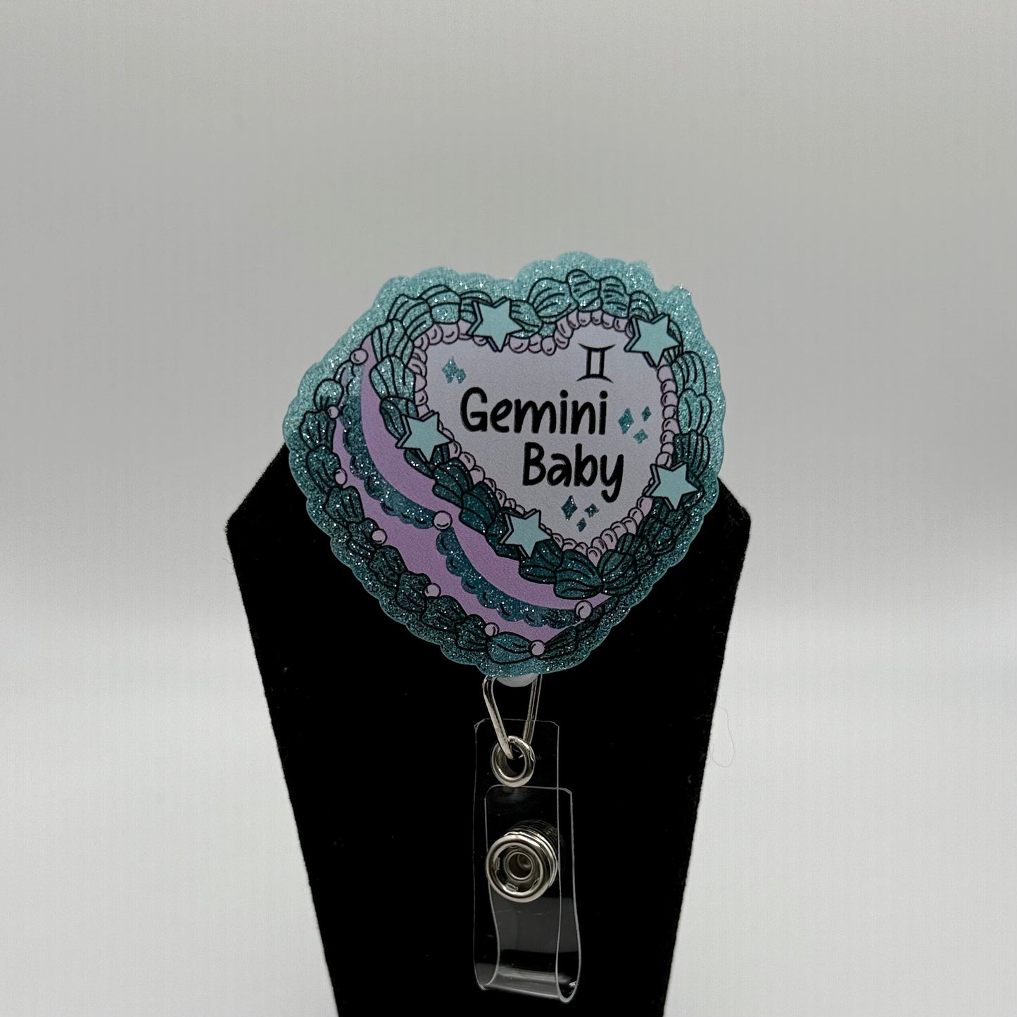 Zodiac Baby Badge Reel