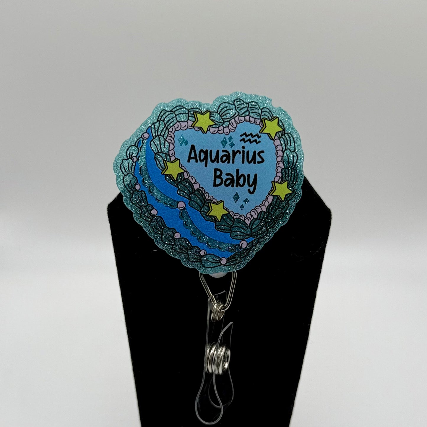 Zodiac Baby Badge Reel
