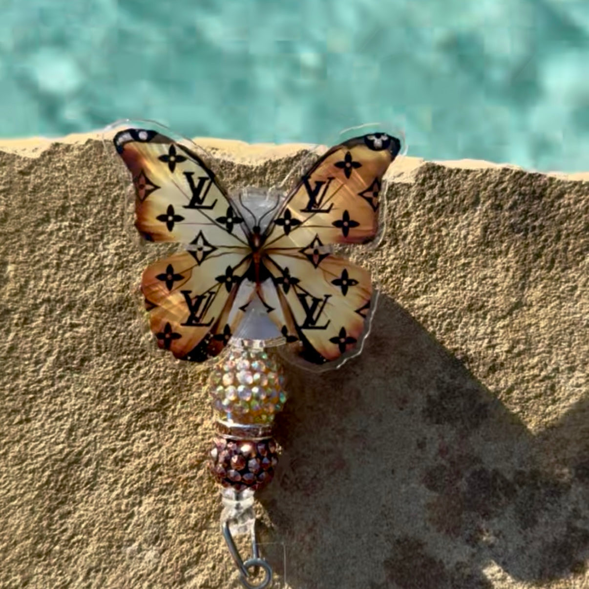 LV Butterfly Badge Reel