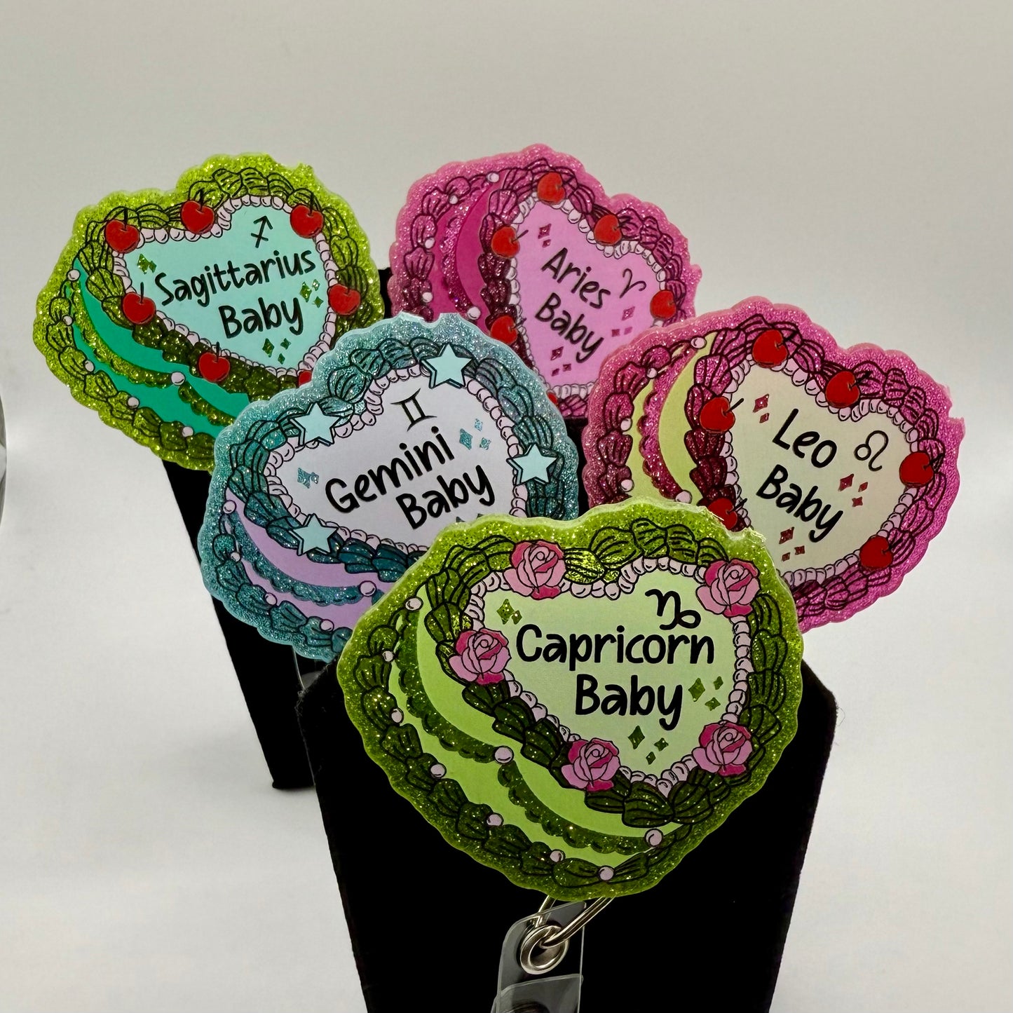 Zodiac Baby Badge Reel