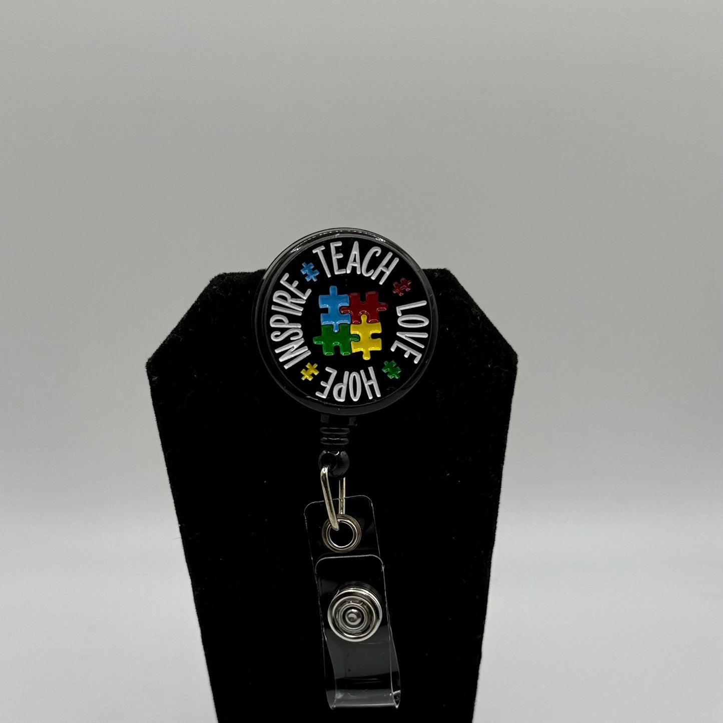 Inspire. Teach. Love. Hope. Autism Awareness Badge Reel