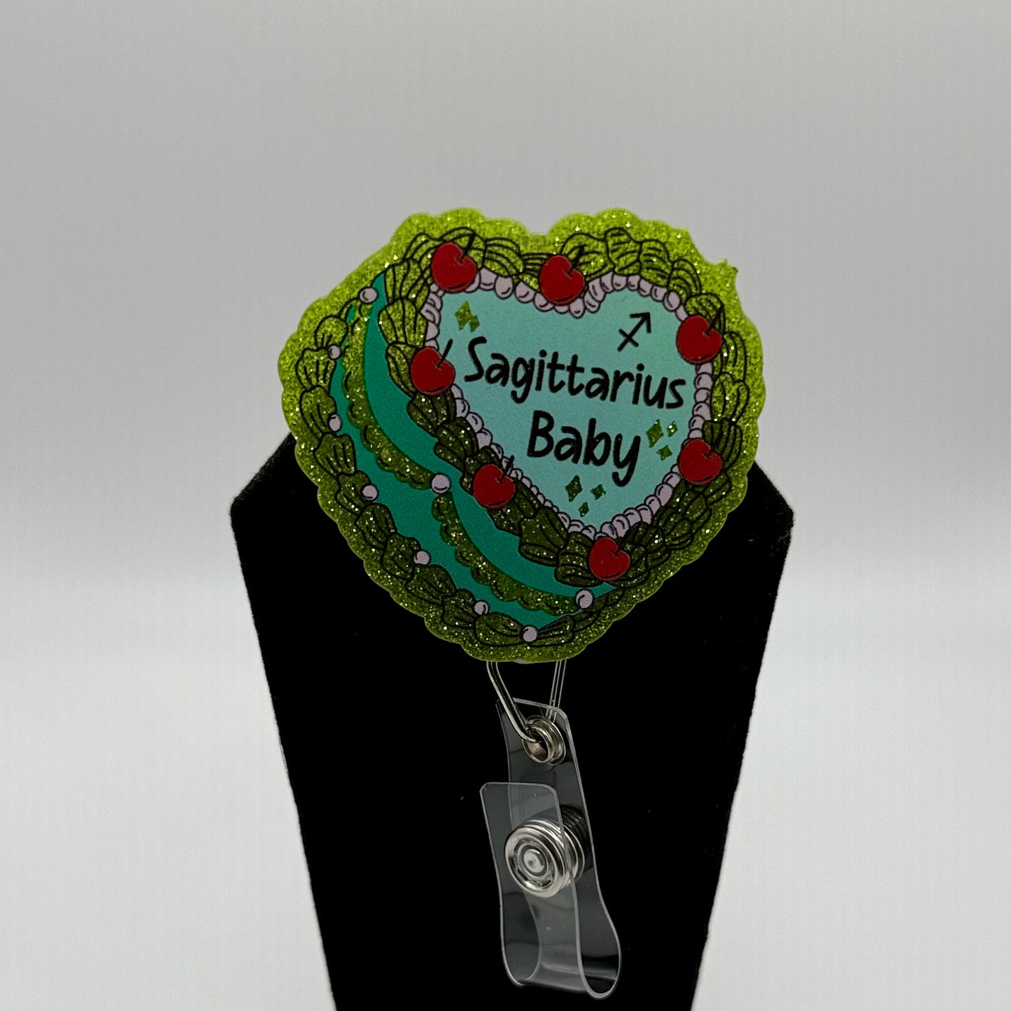 Zodiac Baby Badge Reel
