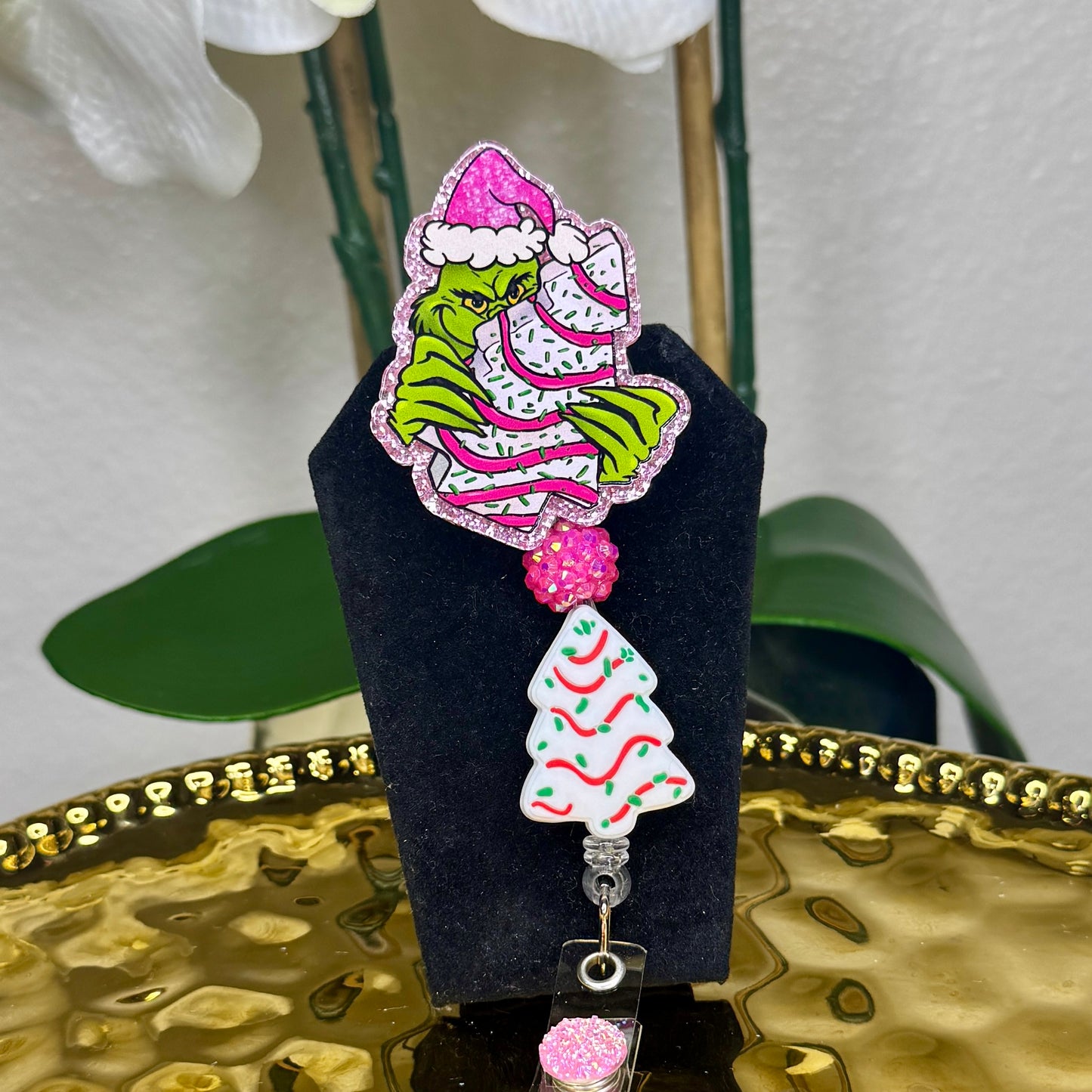 Debbie Cake Grinch Badge Reel