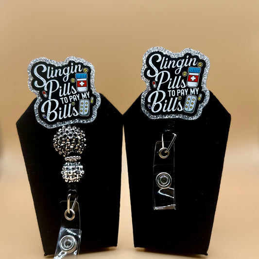 Slinging Pills Badge Reel