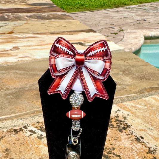 Football Bow Badge Reel