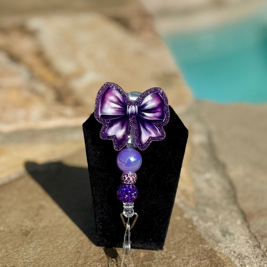 Purple Bow Badge Reel