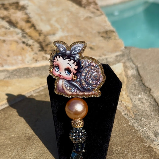 Betty Snail Badge Reel