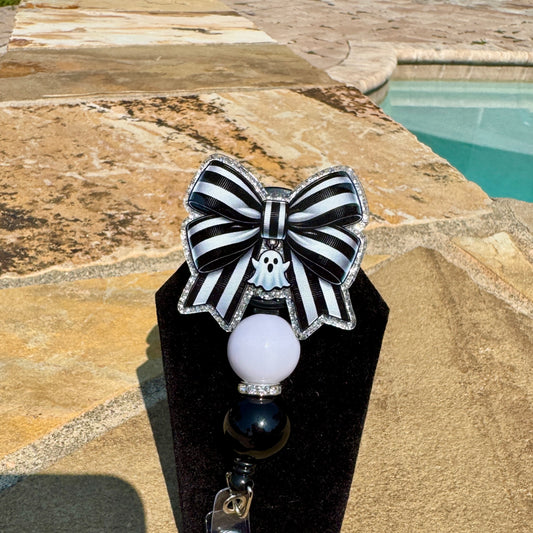 Spooky Season Bow Badge Reel