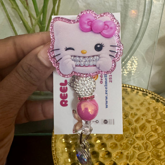 HK with the Grillz Badge Reel