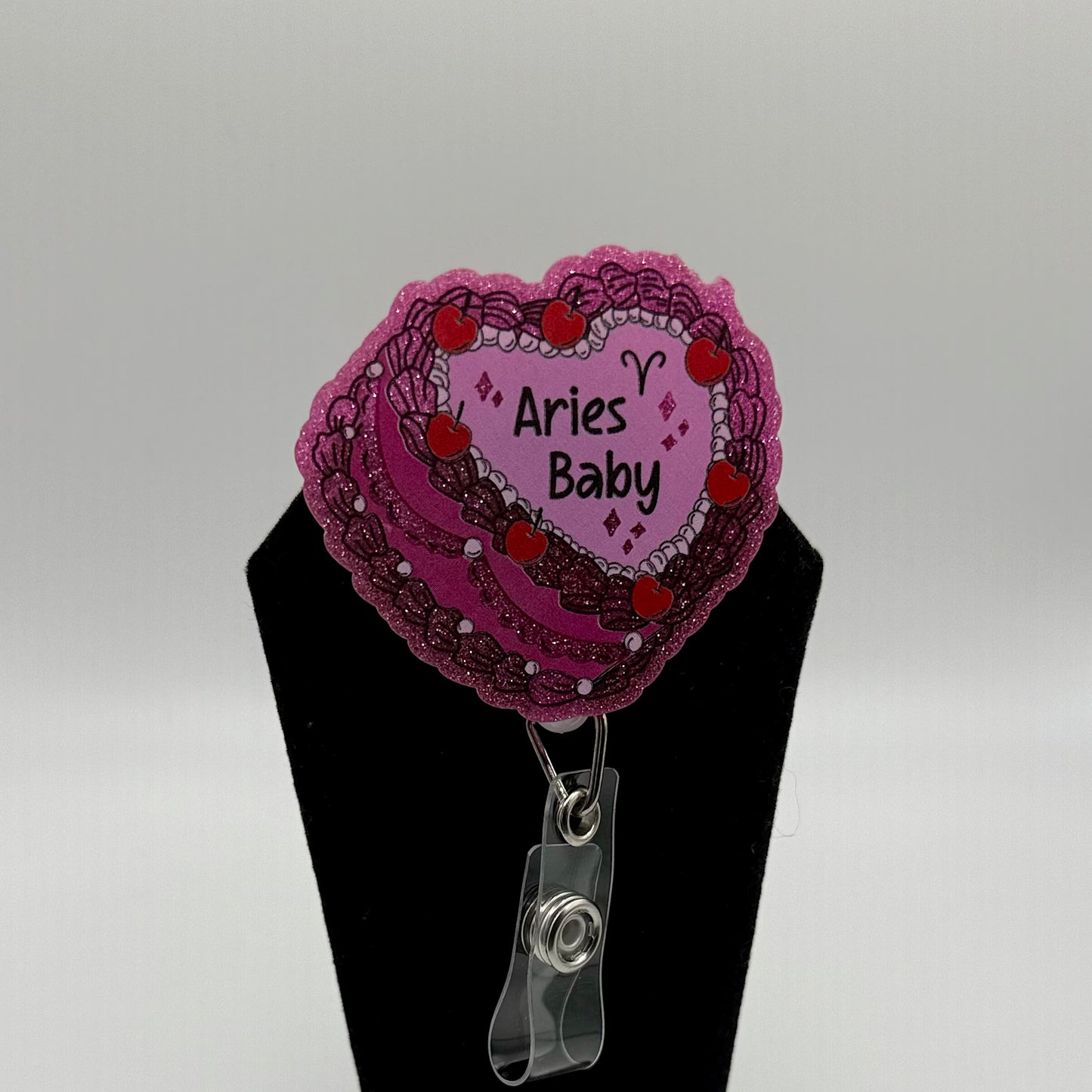 Zodiac Baby Badge Reel