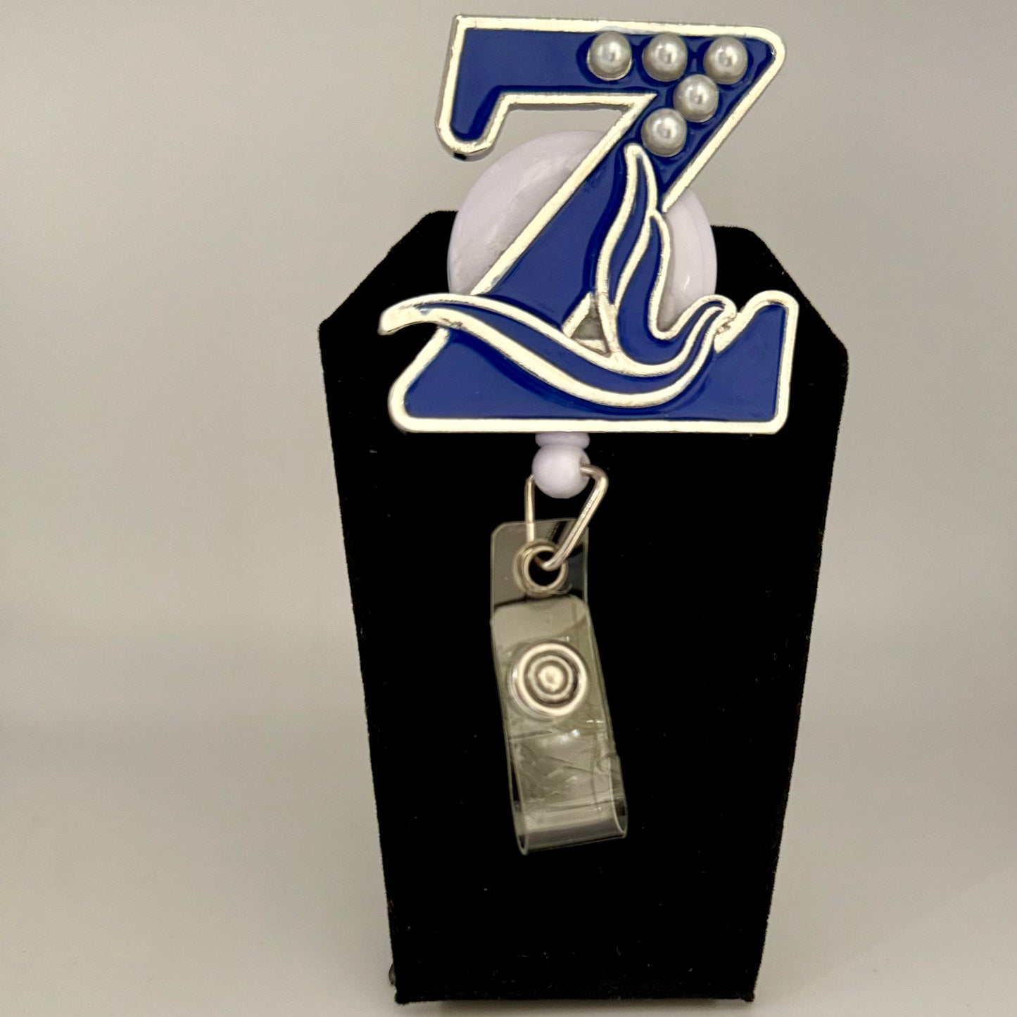 Bold Zeta "Z" Badge Reel